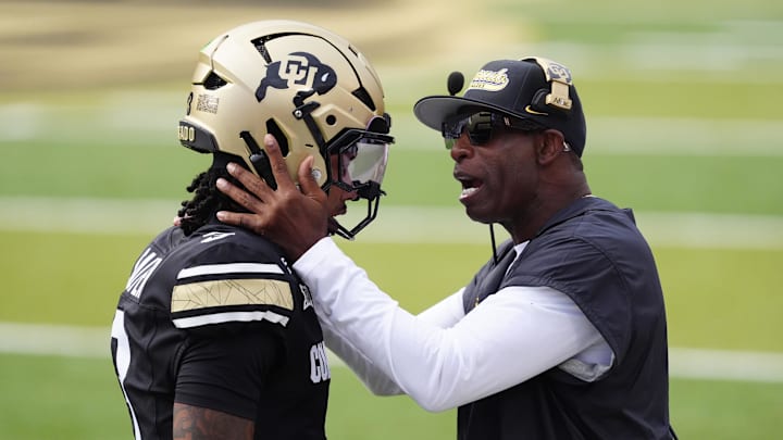 Aug 29, 2025; Boulder, Colorado, USA; Colorado Buffaloes head coach Deion Sanders congratulates Colorado Buffaloes quarterback Kaidon Salter (3) following a touchdown pass in the first quarter against the Georgia Tech Yellow Jackets at Folsom Field. Aug 29, 2025; Boulder, Colorado, USA; Colorado Buffaloes head coach Deion Sanders congratulates Colorado Buffaloes quarterback Kaidon Salter (3) following a touchdown pass in the first quarter against the Georgia Tech Yellow Jackets at Folsom Field.