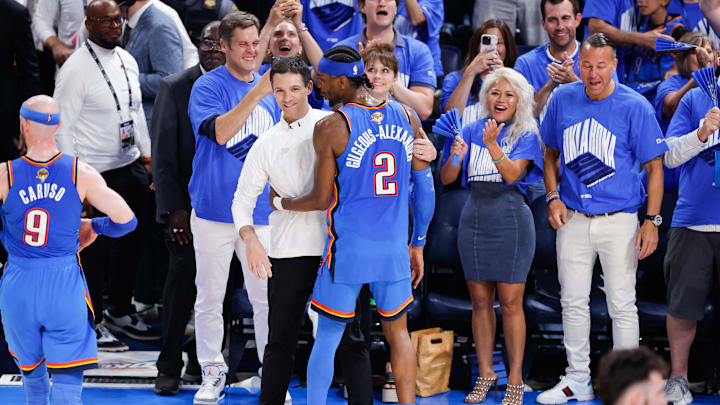 Jun 22, 2025; Oklahoma City, Oklahoma, USA; Oklahoma City Thunder guard Shai Gilgeous-Alexander (2) celebrates with Oklahoma City Thunder head coach Mark Daigneault during the fourth quarter of game seven of the 2025 NBA Finals against the Indiana Pacers at Paycom Center. Mandatory Credit: Alonzo Adams-Imagn Images