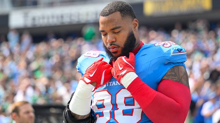 Tennessee Titans defensive tackle Jeffery Simmons (98) stands during the National Anthem against the Philadelphia Eagles during the first half at Nissan Stadium. Mandatory Credit: Steve Roberts-Imagn Images Tennessee Titans defensive tackle Jeffery Simmons (98) stands during the National Anthem against the Philadelphia Eagles during the first half at Nissan Stadium. Mandatory Credit: Steve Roberts-Imagn Images