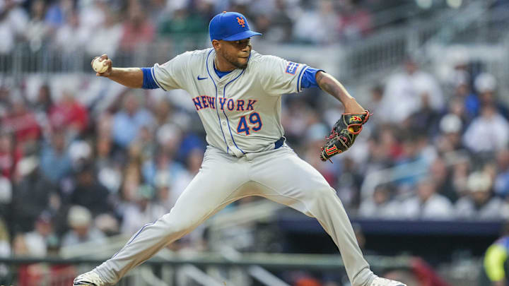 Apr 8, 2024; Cumberland, Georgia, USA; New York Mets starting pitcher Julio Teheran (49) pitches
