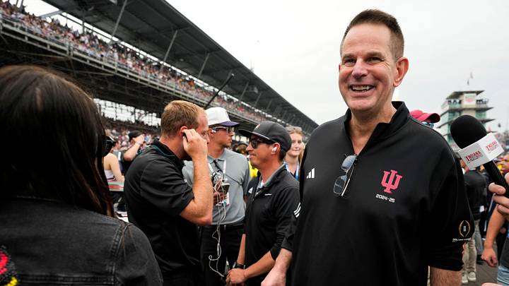 Indiana University's Curt Cignetti walks through pit lane Sunday, May 24, 2026, ahead of the 110th running of the Indianapolis 500 at Indianapolis Motor Speedway. Indiana University's Curt Cignetti walks through pit lane Sunday, May 24, 2026, ahead of the 110th running of the Indianapolis 500 at Indianapolis Motor Speedway.
