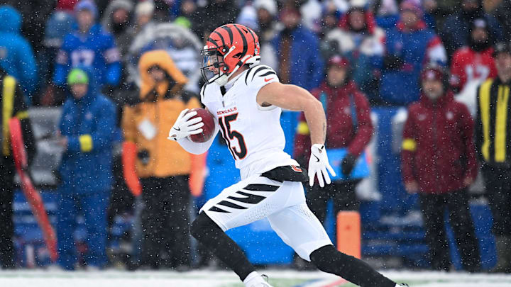Dec 7, 2025; Orchard Park, New York, USA; Cincinnati Bengals wide receiver Charlie Jones (15) returns the opening kickoff against the Buffalo Bills at Highmark Stadium. Mandatory Credit: Mark Konezny-Imagn Images