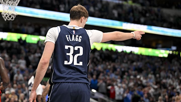 Dec 18, 2025; Dallas, Texas, USA; Dallas Mavericks forward Cooper Flagg (32) motions for Dallas possession 