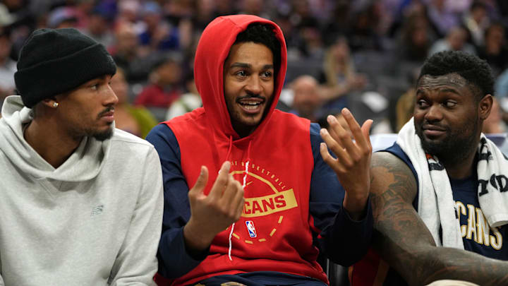 Apr 3, 2026; Sacramento, California, USA; New Orleans Pelicans guard Jordan Poole (center) talks with guard Dejounte Murray (left) and forward Zion Williamson (right) during the third quarter against the Sacramento Kings at Golden 1 Center. Mandatory Credit: Darren Yamashita-Imagn Images