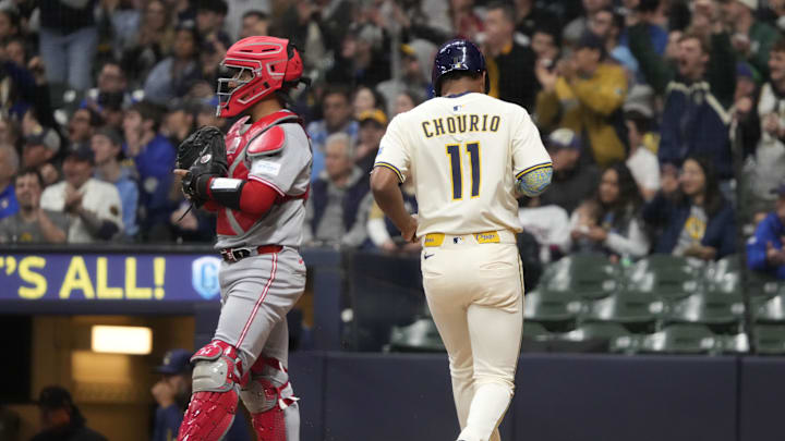 Apr 3, 2025; Milwaukee, Wisconsin, USA;  Milwaukee Brewers outfielder Jackson Chourio (11) scores a run against the Cincinnati Reds in the fourth inning at American Family Field. Mandatory Credit: Michael McLoone-Imagn Images