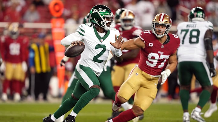 Sep 9, 2024; Santa Clara, California, USA; New York Jets quarterback Tyrod Taylor (2) scrambles against San Francisco 49ers defensive end Nick Bosa (97) during the fourth quarter at Levi's Stadium. Sep 9, 2024; Santa Clara, California, USA; New York Jets quarterback Tyrod Taylor (2) scrambles against San Francisco 49ers defensive end Nick Bosa (97) during the fourth quarter at Levi's Stadium.