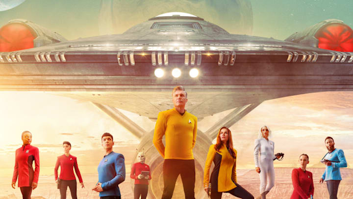 Pictured: (L-R) Celia Rose Gooding as Uhura, Melissa Navia as Ortegas, Ethan Peck as Spock, Bruce Horak as Hemmer, Anson Mount as Pike, Rebecca Romijn as Una, Jess Bush as Chapel, Christina Chong as La’an and Baby Olusanmokun as M’Benga in the official key art of the Paramount+ original series STAR TREK: STRANGE NEW WORLDS. Photo Cr: James Dimmock/Paramount+ ©2022 ViacomCBS. All Rights Reserved.