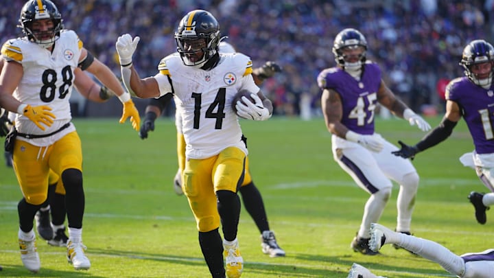 Dec 7, 2025; Baltimore, Maryland, USA; Pittsburgh Steelers running back Kenneth Gainwell (14) runs with the ball against the Baltimore Ravens for a touchdown during the first half at M&T Bank Stadium. Mandatory Credit: Mitch Stringer-Imagn Images Dec 7, 2025; Baltimore, Maryland, USA; Pittsburgh Steelers running back Kenneth Gainwell (14) runs with the ball against the Baltimore Ravens for a touchdown during the first half at M&T Bank Stadium. Mandatory Credit: Mitch Stringer-Imagn Images