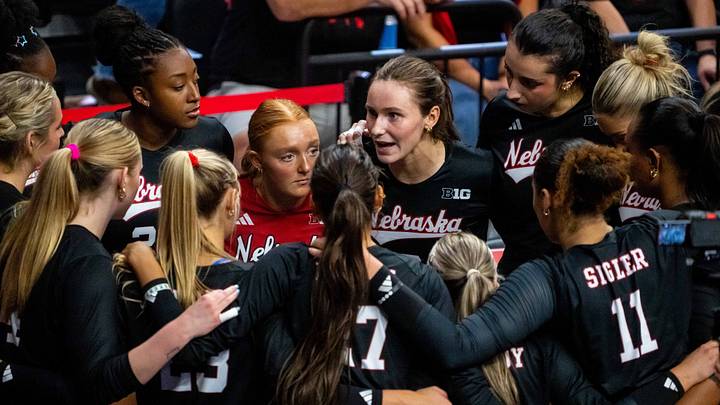Oct 10, 2026; Lincoln, Nebraska, USA; Nebraska Cornhuskers setter Bergen Reilly (2) talks with teammates before the third set against the Wisconsin Badgers at Bob Devaney Sport Center. Mandatory Credit: Dylan Widger-Imagn Images Oct 10, 2026; Lincoln, Nebraska, USA; Nebraska Cornhuskers setter Bergen Reilly (2) talks with teammates before the third set against the Wisconsin Badgers at Bob Devaney Sport Center. Mandatory Credit: Dylan Widger-Imagn Images