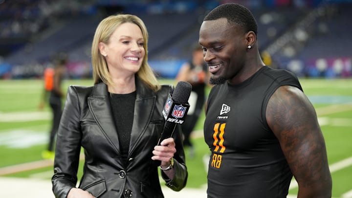 Feb 28, 2026; Indianapolis, IN, USA; NFL Network reporter Stacey Dales interview Notre Dame running back Jeremiyah Love (RB11) during the NFL Scouting Combine at Lucas Oil Stadium. 