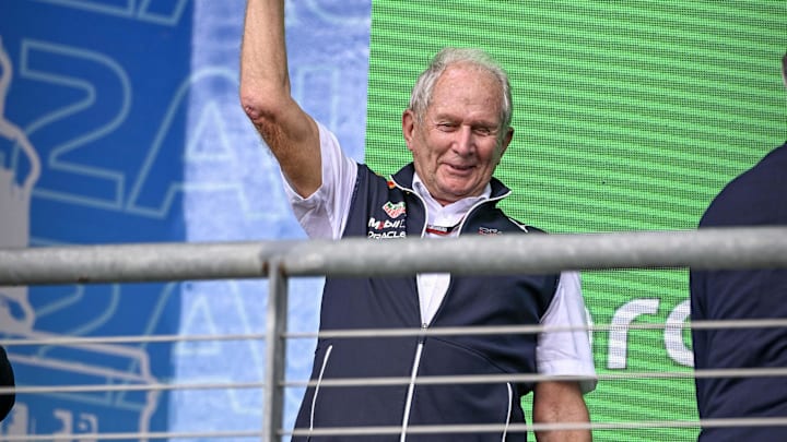 Oct 23, 2022; Austin, Texas, USA; Helmut Marko of Red Bull Racing Team holds up the World Constructors' Champions trophy after the running of the U.S. Grand Prix F1 race at Circuit of the Americas. Mandatory Credit: Jerome Miron-Imagn Images