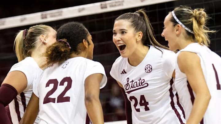 Mississippi State volleyball players celebrate during the match between the South Alabama Jaguars and the Mississippi State Bulldogs at the Newell-Grissom Building in Starkville, MS. Mississippi State volleyball players celebrate during the match between the South Alabama Jaguars and the Mississippi State Bulldogs at the Newell-Grissom Building in Starkville, MS.