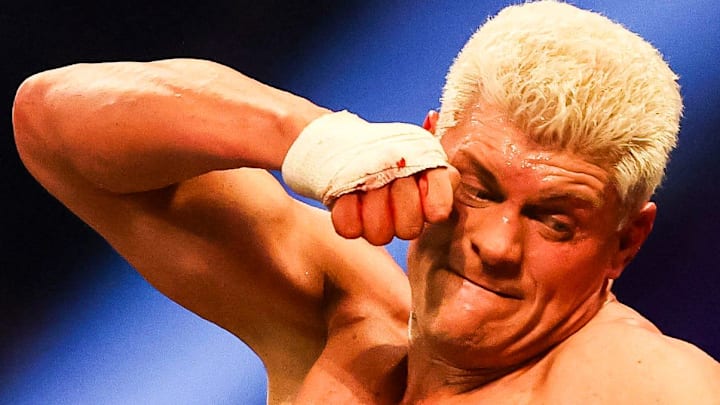 Cody Rhodes throws a punch