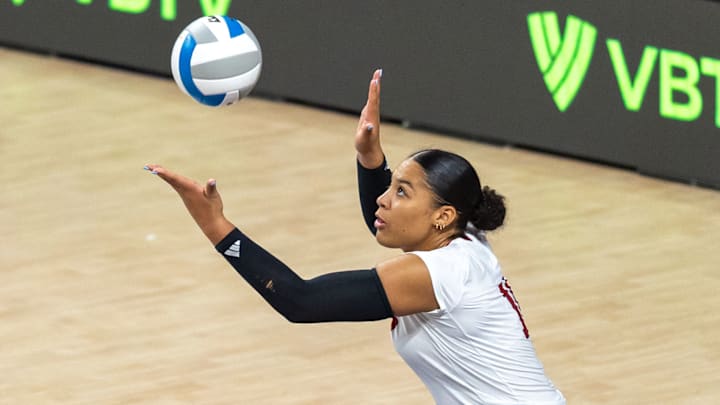 Nebraska outside hitter Teraya Sigler prepares to serve the ball during the third set of the AVCA First Serve. Nebraska outside hitter Teraya Sigler prepares to serve the ball during the third set of the AVCA First Serve.