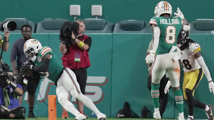 Miami Dolphins cornerback Noah Igbinoghene (9) intercepts a pass late in the game against the Pittsburgh Steelers at Hard Rock Stadium in Miami Gardens, Oct. 23, 2022. Miami Dolphins cornerback Noah Igbinoghene (9) intercepts a pass late in the game against the Pittsburgh Steelers at Hard Rock Stadium in Miami Gardens, Oct. 23, 2022.