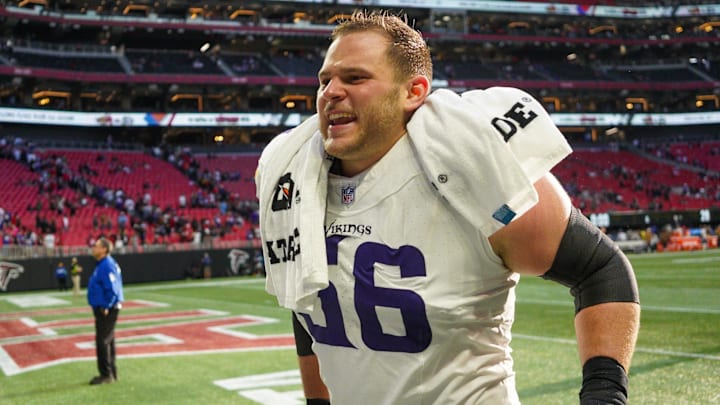 Nov 5, 2023; Atlanta, Georgia, USA; Minnesota Vikings center Garrett Bradbury (56) runs off the field after a victory against the Atlanta Falcons at Mercedes-Benz Stadium. Nov 5, 2023; Atlanta, Georgia, USA; Minnesota Vikings center Garrett Bradbury (56) runs off the field after a victory against the Atlanta Falcons at Mercedes-Benz Stadium.