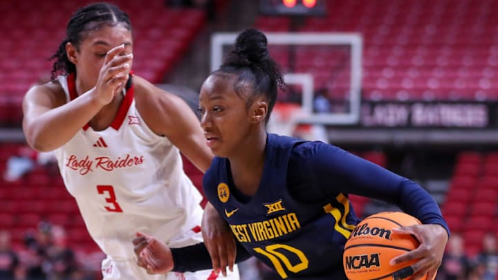 West Virginia's Jordan Harrison dribbles against Texas Tech during a Big 12 Conference women's basketball game, Wednesday, Jan. 8, 2025, in United Supermarkets Arena.