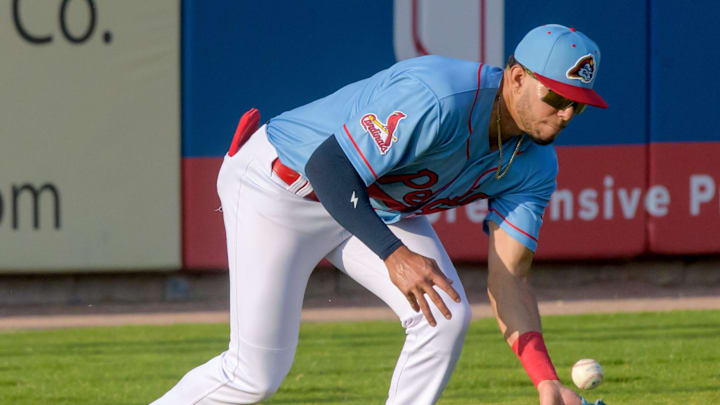 Peoria Chiefs outfielder Joshua Baez fields a hit to left field during a game against the Michigan Whitecaps on Wednesday, May 15, 2024 at Dozer Park in Peoria.