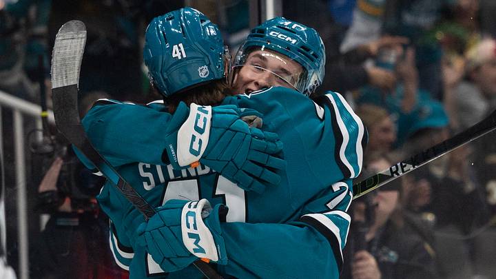Oct 13, 2026; San Jose, California, USA;  San Jose Sharks center Macklin Celebrini (71) hugs San Jose Sharks left wing Ivar Stenberg (41) after scoring a goal during the second period against the Boston Bruins at SAP Center at San Jose.  Mandatory Credit: Stan Szeto-Imagn Images