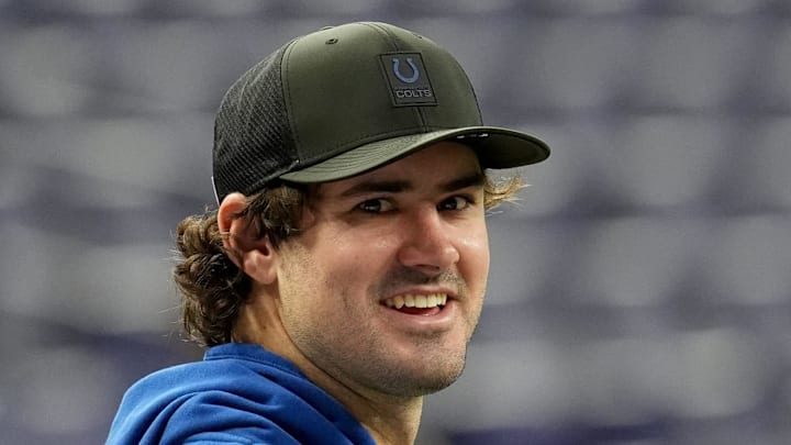 An injured Indianapolis Colts quarterback Daniel Jones talks An injured Indianapolis Colts quarterback Daniel Jones talks