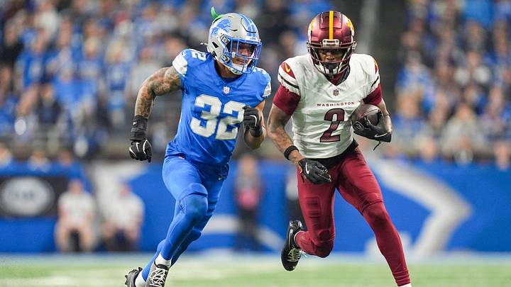 Detroit Lions safety Brian Branch (32) runs after Washington Commanders wide receiver Dyami Brown (2) in the first half of the NFC divisional round at Ford Field in Detroit on Saturday, Jan. 18, 2025.