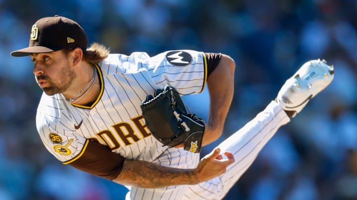Mar 26, 2026; San Diego, California, USA; San Diego Padres relief pitcher David Morgan (66) throws a pitch during the eighth inning against the Detroit Tigers at Petco Park. Mandatory Credit: David Frerker-Imagn Images