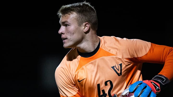 Vandegrift's Charlie Reed looks for an open teammate to throw the ball two after a save in the second half of the class 6A boys regional quarterfinal playoff game at House Park in Austin, April 2, 2024. Vandegrift won 1-0 in extra time.