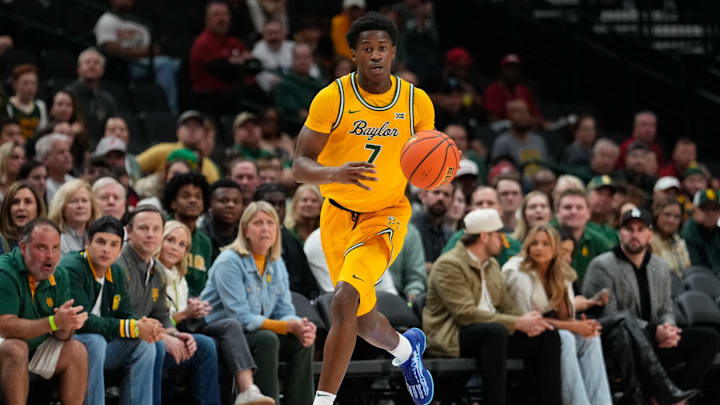 Nov 9, 2024; Dallas, Texas, USA; Baylor Bears guard VJ Edgecombe (7) dribbles the ball upcourt against the Arkansas Razorbacks during the first half at American Airlines Center. Mandatory Credit: Chris Jones-Imagn Images Nov 9, 2024; Dallas, Texas, USA; Baylor Bears guard VJ Edgecombe (7) dribbles the ball upcourt against the Arkansas Razorbacks during the first half at American Airlines Center. Mandatory Credit: Chris Jones-Imagn Images