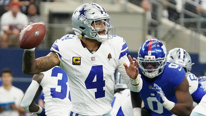 Dallas Cowboys quarterback Dak Prescott looks to pass the ball against the New York Giants at AT&T Stadium. Dallas Cowboys quarterback Dak Prescott looks to pass the ball against the New York Giants at AT&T Stadium.