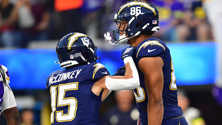 Los Angeles Chargers tight end Oronde Gadsden II reacts after scoring a touchdown with wide receiver Ladd McConkey.