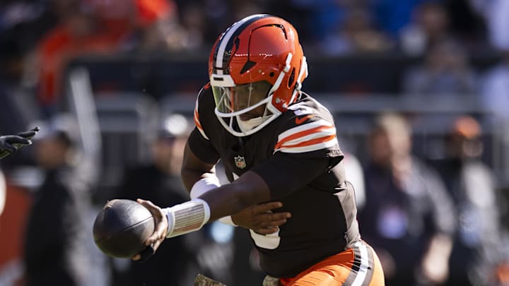 Nov 3, 2024; Cleveland, Ohio, USA; Cleveland Browns quarterback Jameis Winston (5) hands the ball off during the first quarter against the Los Angeles Chargers at Huntington Bank Field.