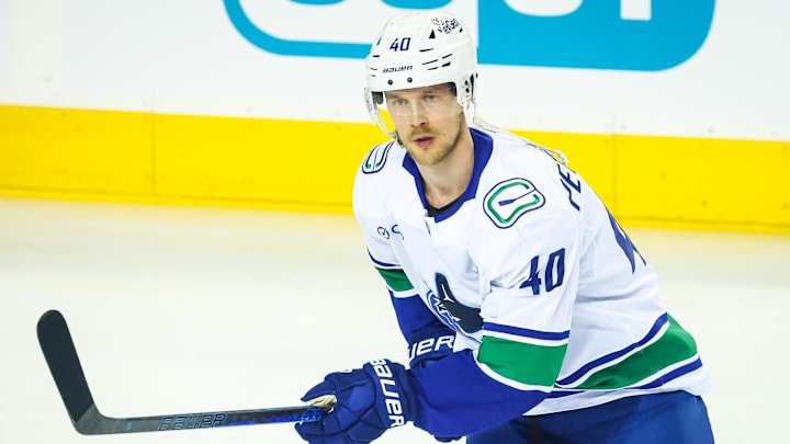 Mar 12, 2025; Calgary, Alberta, CAN; Vancouver Canucks center Elias Pettersson (40) skates during the warmup period against the Calgary Flames at Scotiabank Saddledome. Mandatory Credit: Sergei Belski-Imagn Images