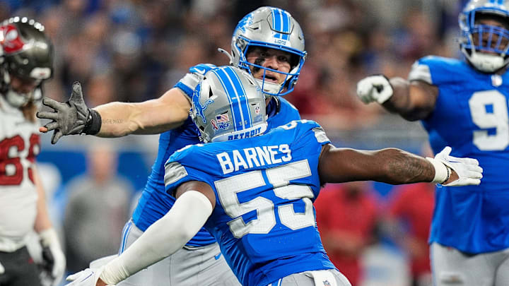 Detroit Lions defensive end Aidan Hutchinson (97) and linebacker Derrick Barnes (55) celebrate a play against Buccaneers Detroit Lions defensive end Aidan Hutchinson (97) and linebacker Derrick Barnes (55) celebrate a play against Buccaneers