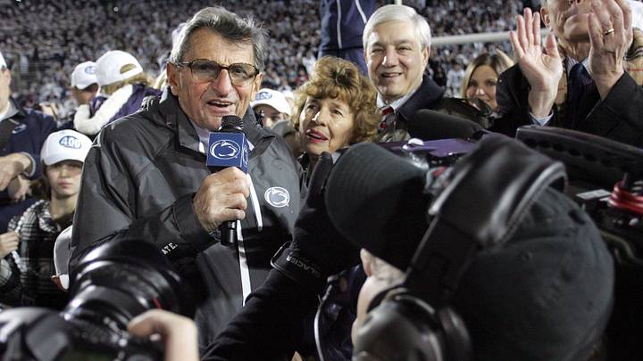 Former Penn State Nittany Lions football coach Joe Paterno speaks to the crowd at Beaver Stadium as his wife Sue looks on after his 400th career win in 2010.