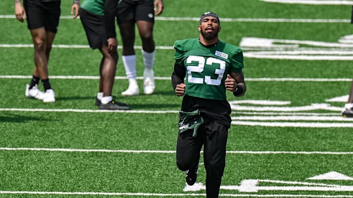 May 23, 2023; Florham Park, NJ, USA; New York Jets safety Chuck Clark (23) warms up during OTA s at Atlantic Health Jets Training Center. Mandatory Credit: Jonathan Jones-USA TODAY Sports May 23, 2023; Florham Park, NJ, USA; New York Jets safety Chuck Clark (23) warms up during OTA s at Atlantic Health Jets Training Center. Mandatory Credit: Jonathan Jones-USA TODAY Sports