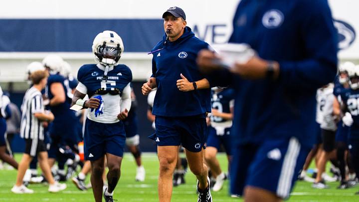 Penn State Nittany Lions football coach Matt Campbell jogs at the start of a practice session inside Holuba Hall. Penn State Nittany Lions football coach Matt Campbell jogs at the start of a practice session inside Holuba Hall.