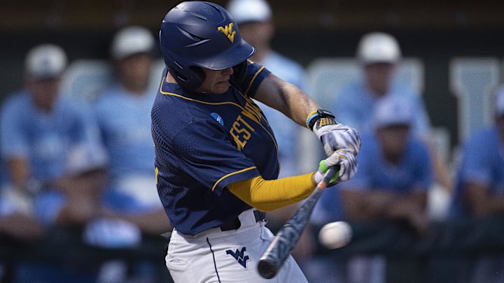 Jun 8, 2024; Chapel Hill, NC, USA; West Virginia Mountaineers Brodie Kresser (12) bats against the North Carolina Tar Heels in the second inning of the DI Baseball Super Regional at Boshamer Stadium. Mandatory Credit: Jeffrey Camarati-Imagn Images