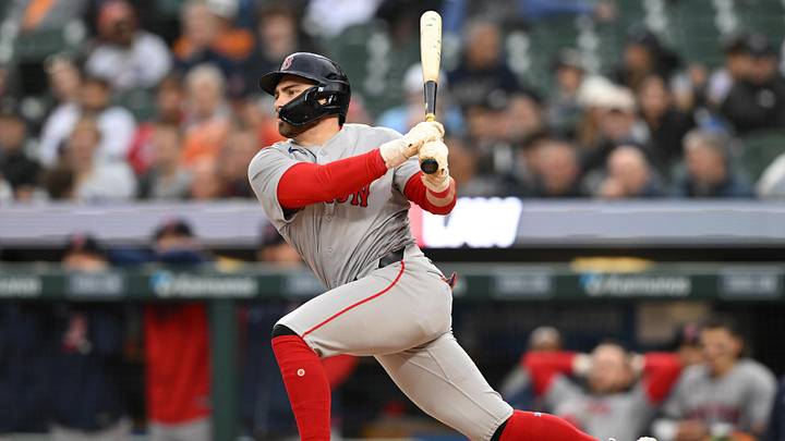 May 5, 2026; Detroit, Michigan, USA; Boston Red Sox third baseman Caleb Durbin (5) hits an RBI single against the Detroit Tigers in the third inning at Comerica Park. Mandatory Credit: Lon Horwedel-Imagn Images