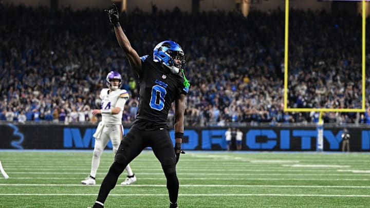 Jan 5, 2025; Detroit, Michigan, USA; Detroit Lions cornerback Terrion Arnold (0) celebrates after breaking up a fourth down pass by Minnesota Vikings quarterback Sam Darnold (14) in the end zone in the third quarter at Ford Field. The pass was incomplete.Mandatory Credit: Lon Horwedel-Imagn Images