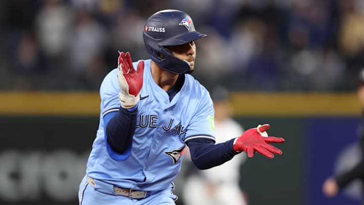Oct 16, 2025; Seattle, Washington, USA; Toronto Blue Jays second baseman Andres Gimenez (0) celebrates after hitting a two-run home run in the third inning against the Seattle Mariners during game four of the ALCS round for the 2025 MLB playoffs at T-Mobile Park. Mandatory Credit: Kevin Ng-Imagn Images