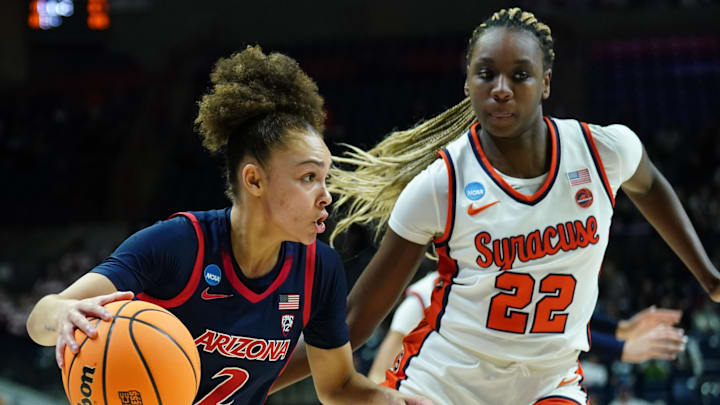 Mar 23, 2024; Storrs, Connecticut, USA; Arizona Wildcats guard Jada Williams (2) drives the ball against Syracuse Orange forward Kyra Wood (22) in the first half at Harry A. Gampel Pavilion. 