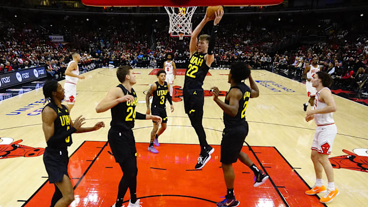 Nov 4, 2024; Chicago, Illinois, USA; Utah Jazz forward Kyle Filipowski (22) grabs a rebound against the Chicago Bulls during the first half at United Center. Mandatory Credit: David Banks-Imagn Images