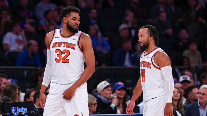 New York Knicks center Karl-Anthony Towns (32) talks with point guard Jalen Brunson. New York Knicks center Karl-Anthony Towns (32) talks with point guard Jalen Brunson.