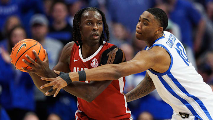 Jan 18, 2025; Lexington, Kentucky, USA; Alabama Crimson Tide center Clifford Omoruyi (11) handles the ball against Kentucky Wildcats forward Brandon Garrison (10) during the second half at Rupp Arena at Central Bank Center. Mandatory Credit: Jordan Prather-Imagn Images Jan 18, 2025; Lexington, Kentucky, USA; Alabama Crimson Tide center Clifford Omoruyi (11) handles the ball against Kentucky Wildcats forward Brandon Garrison (10) during the second half at Rupp Arena at Central Bank Center. Mandatory Credit: Jordan Prather-Imagn Images