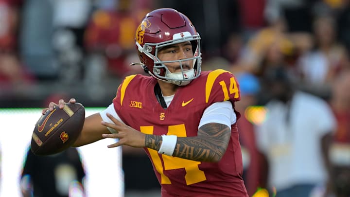 Oct 11, 2025; Los Angeles, California, USA;  USC Trojans quarterback Jayden Maiava (14) throws a pass in the first half against the Michigan Wolverines at United Airlines Field at the Los Angeles Memorial Coliseum. Mandatory Credit: Jayne Kamin-Oncea-Imagn Images