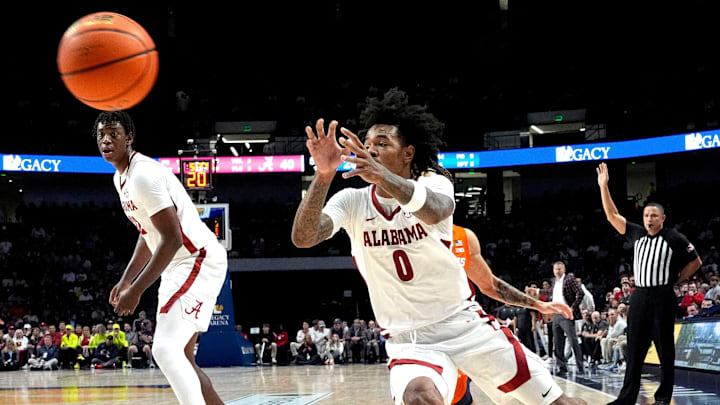 Nov 20, 2024; Birmingham, AL, USA; Alabama guard Labaron Philon (0) sprints to the ball on an inbound play against Illinois in the CM Newton Classic at Legacy Arena. Mandatory Credit: Gary Cosby Jr.-Tuscaloosa News