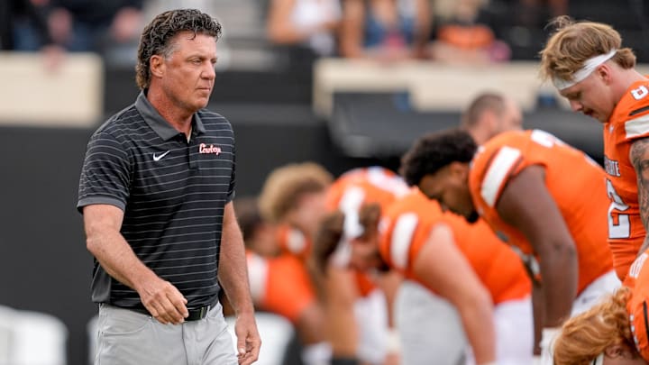 Oklahoma State Head coach Mike Gundy walks on the field before an NCAA football game between Oklahoma State (OSU) and UT Martin in Stillwater, Okla., on Thursday, Aug. 28, 2025.