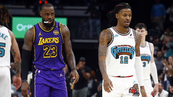 LeBron James and Ja Morant walk down the court during a matchup between the Lakers and Grizzlies in November