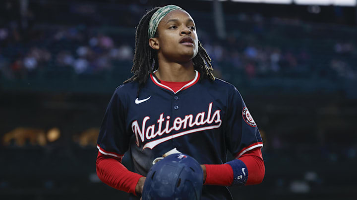 Sep 19, 2024; Chicago, Illinois, USA; Washington Nationals shortstop CJ Abrams (5) smiles after scoring against the Chicago Cubs during the first inning at Wrigley Field