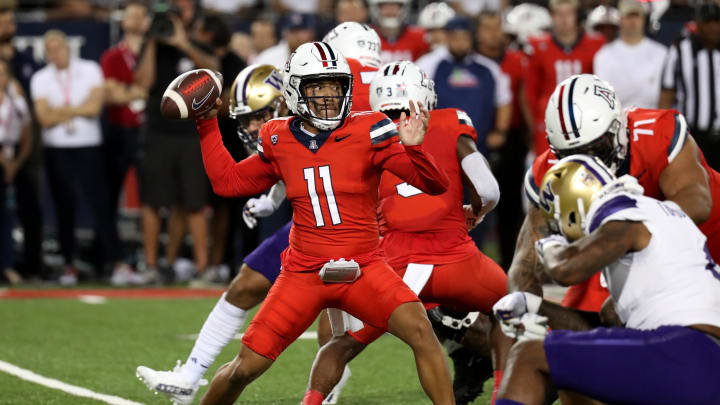 Sep 30, 2023; Tucson, Arizona, USA; Arizona Wildcats quarterback Noah Fifita (11) makes a pass in the first half at Arizona Stadium. Mandatory Credit: Zachary BonDurant-USA TODAY Sports
